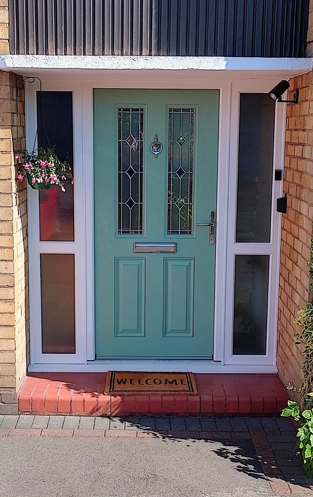 Chartwell green composite front door installed by Window Smart
